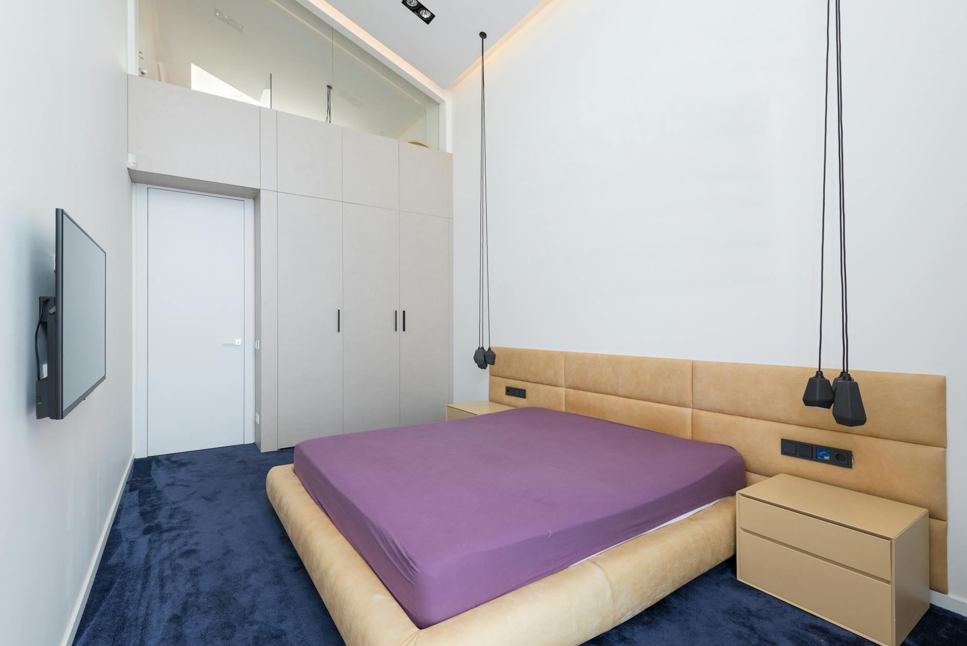 Feng Shui for Bedroom - A serene bedroom with a made bed, soft lighting, and minimal decor.