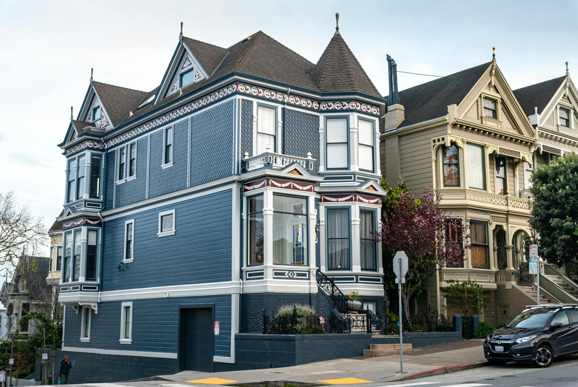 San Francisco Victorian house on steep hill with bay windows and morning fog