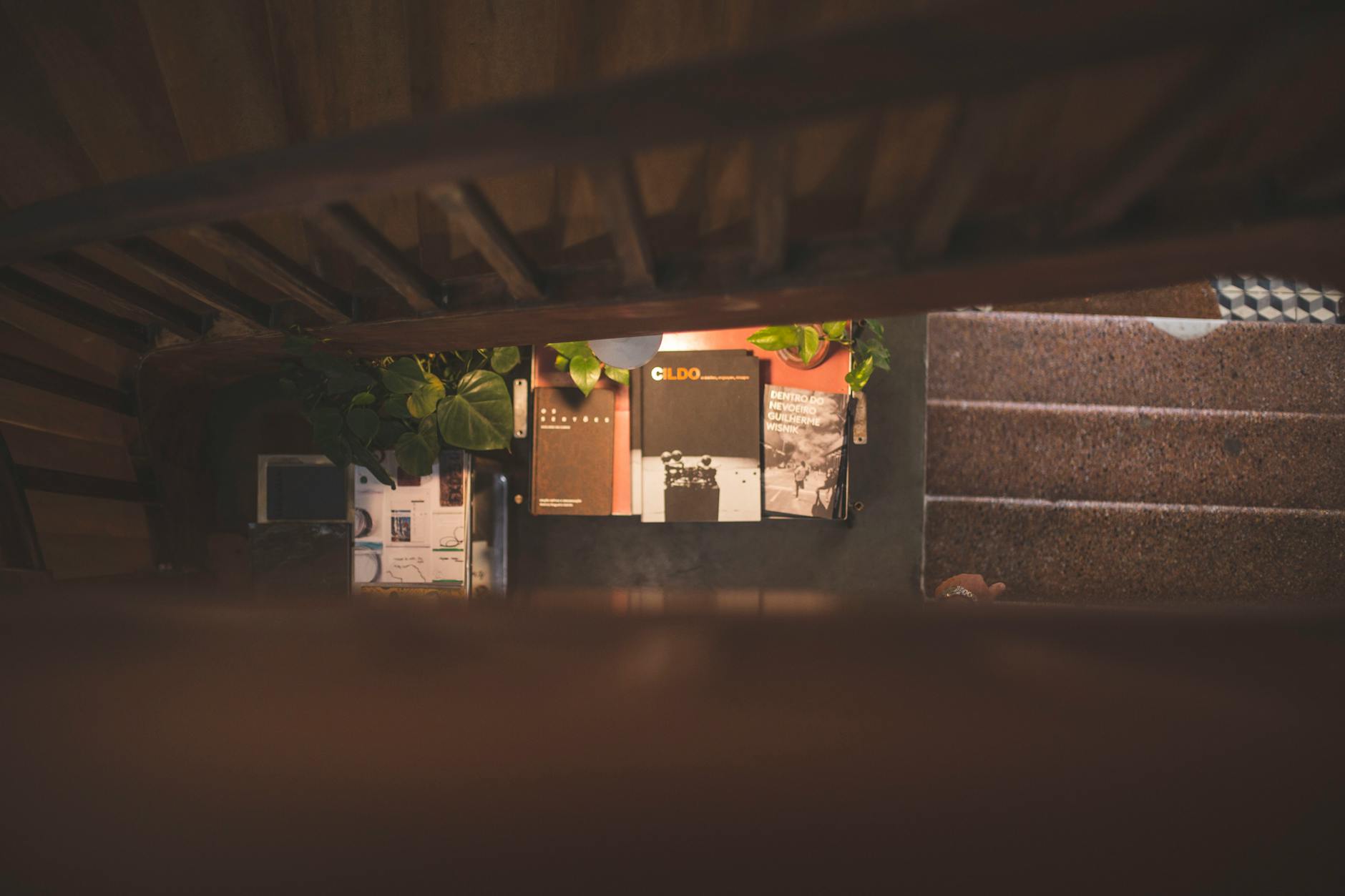 A modern staircase with built-in under-stair storage and shelving.