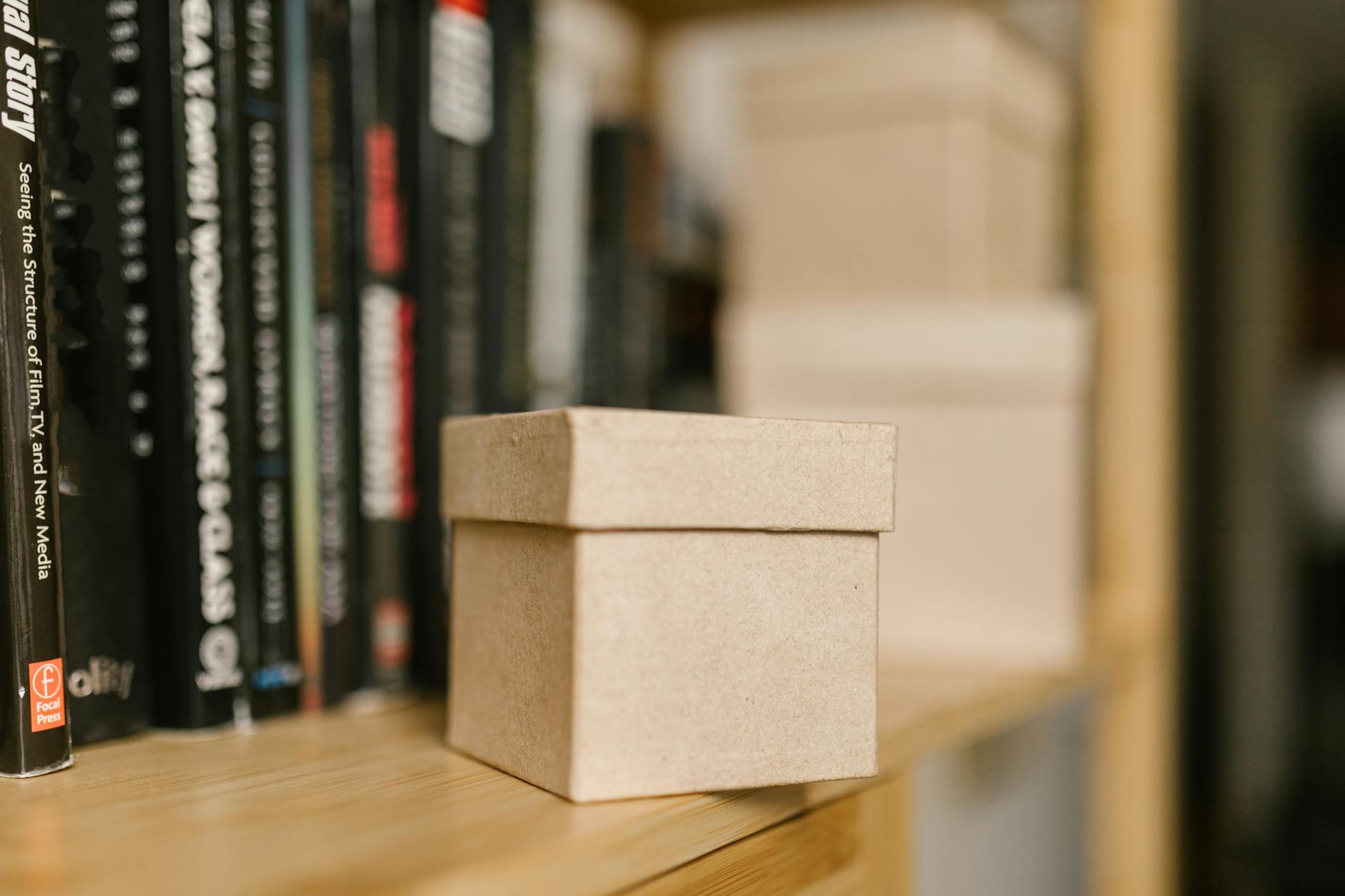 A well-organized home office with a desk, storage, and natural light.